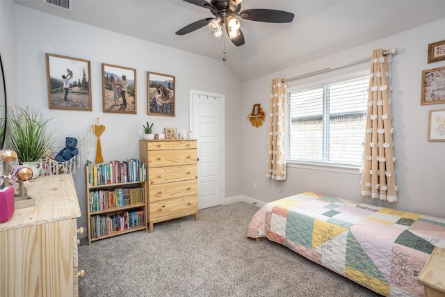 bedroom featuring lofted ceiling, ceiling fan, and carpet flooring