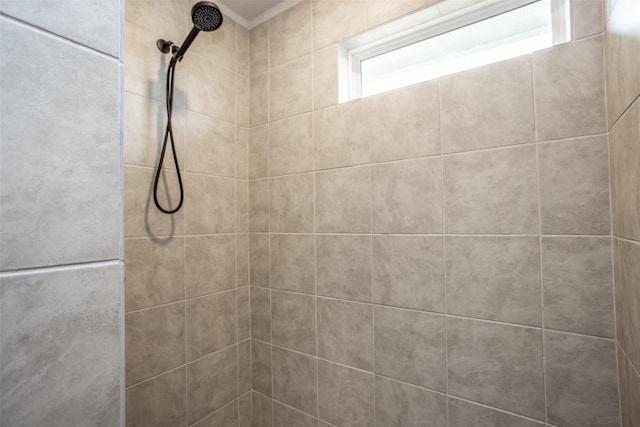 room details featuring tiled shower