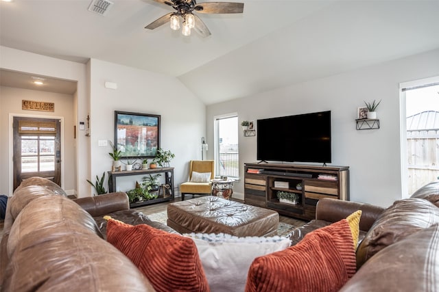 living room featuring ceiling fan, vaulted ceiling, and hardwood / wood-style floors