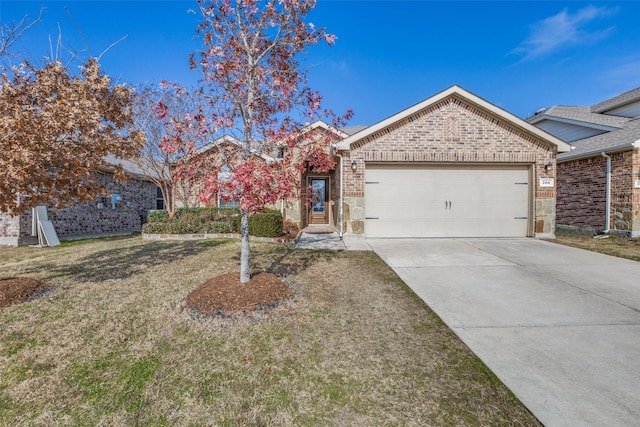 view of front facade with a garage and a front yard