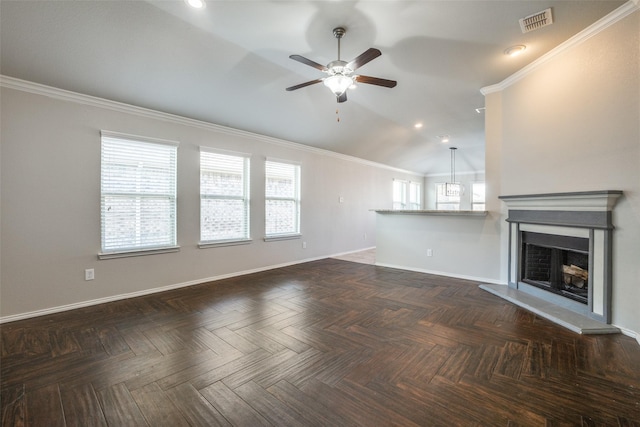 unfurnished living room with ceiling fan, ornamental molding, and dark parquet flooring