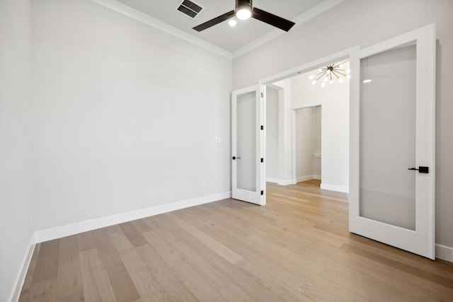 unfurnished bedroom with ornamental molding, a closet, ceiling fan, and light hardwood / wood-style floors