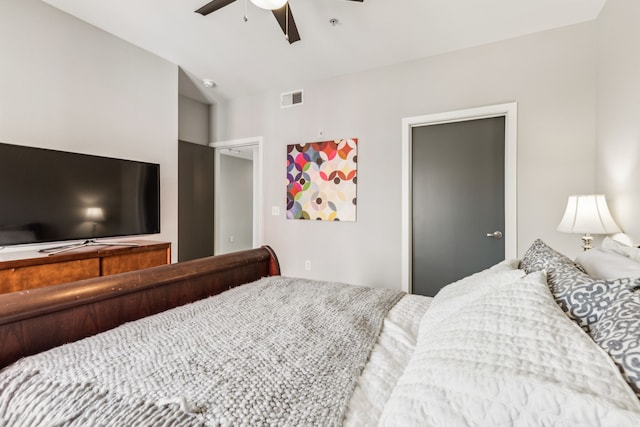 bedroom with vaulted ceiling and ceiling fan