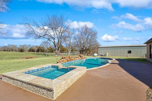 view of pool featuring an in ground hot tub, a patio, and a lawn