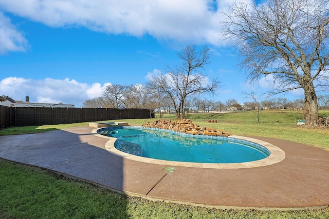 view of pool featuring a yard and a patio area