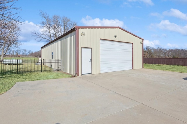 garage with a yard