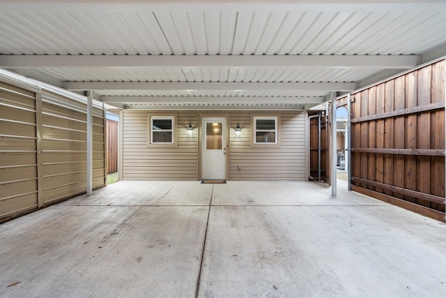 garage featuring a carport