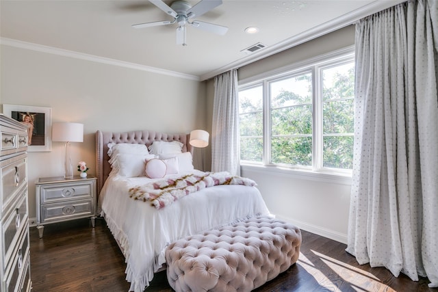 bedroom with dark hardwood / wood-style flooring, ornamental molding, and ceiling fan