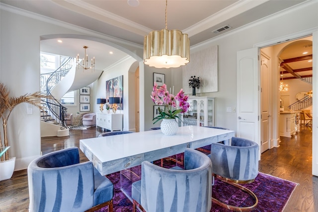 dining space featuring beam ceiling, dark wood-type flooring, ornamental molding, and a chandelier