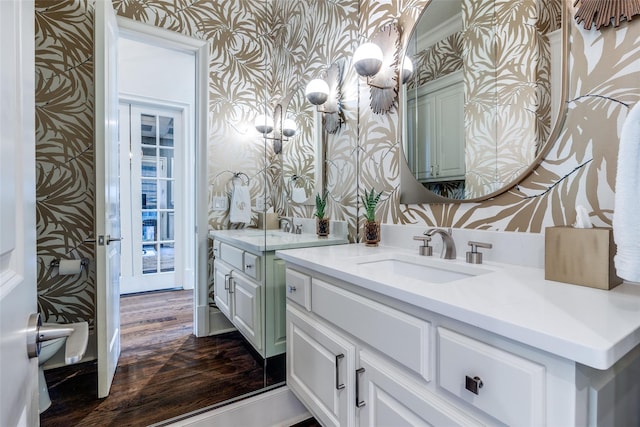 bathroom with vanity and hardwood / wood-style flooring