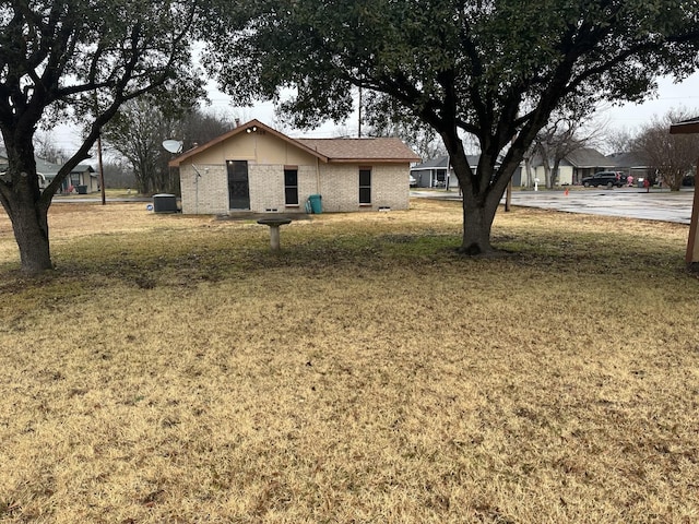 exterior space with a front lawn