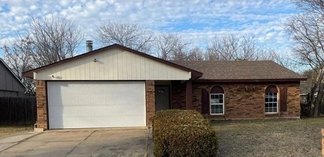 single story home with a garage