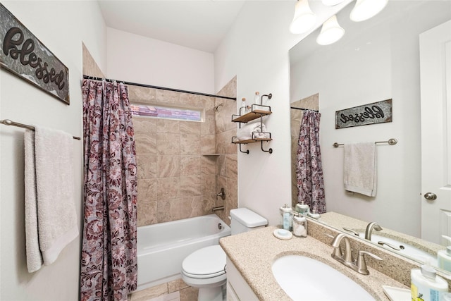 full bathroom with vanity, shower / tub combo with curtain, and toilet