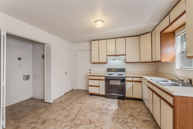 kitchen featuring cream cabinets, dishwasher, sink, and electric range