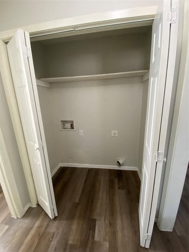 washroom with hookup for an electric dryer, dark wood-type flooring, and washer hookup