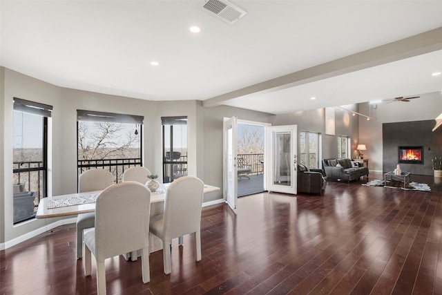 3916 Sunnyview Ln, Flower Mound, TX 75022 - dining area featuring plenty of natural light, wood finished floors, baseboards, and recessed lighting
