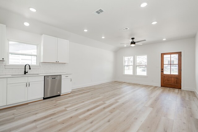 308 Santa Fe, Wolfe City, TX 75496 - kitchen with a sink, tasteful backsplash, dishwasher, visible vents, and a healthy amount of sunlight