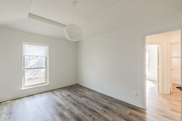 unfurnished room featuring hardwood / wood-style floors