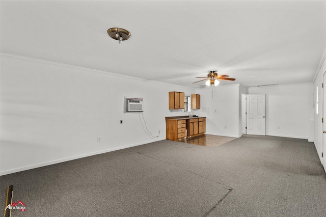 unfurnished living room featuring crown molding, ceiling fan, and an AC wall unit