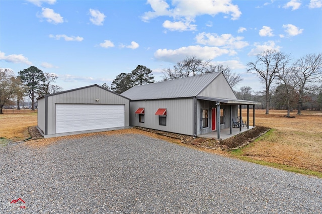 view of front facade with a garage and a porch