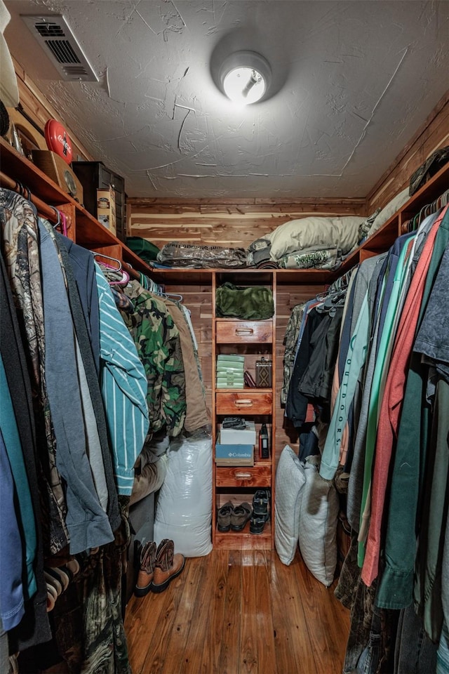 spacious closet featuring wood-type flooring