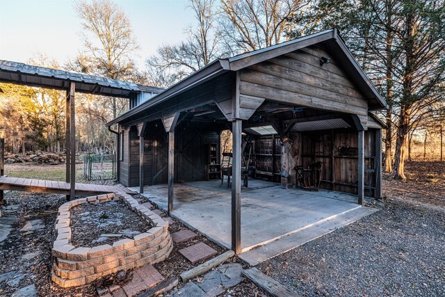 view of property exterior at dusk