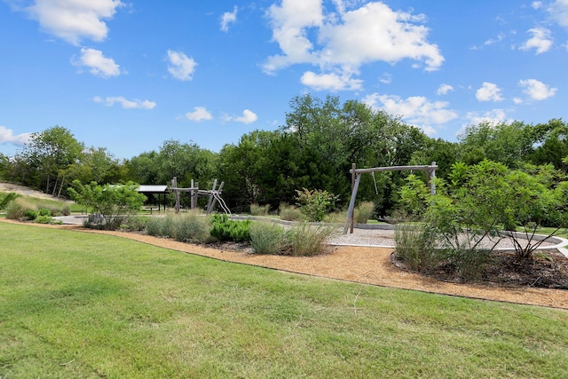 surrounding community featuring a yard