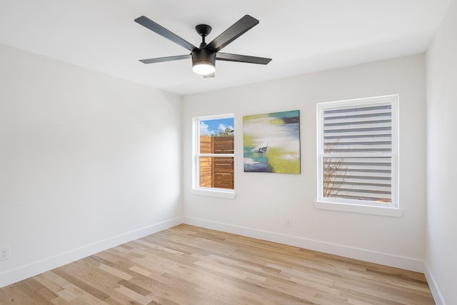 unfurnished room featuring light hardwood / wood-style floors and ceiling fan