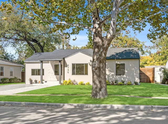 view of front of home with a front yard