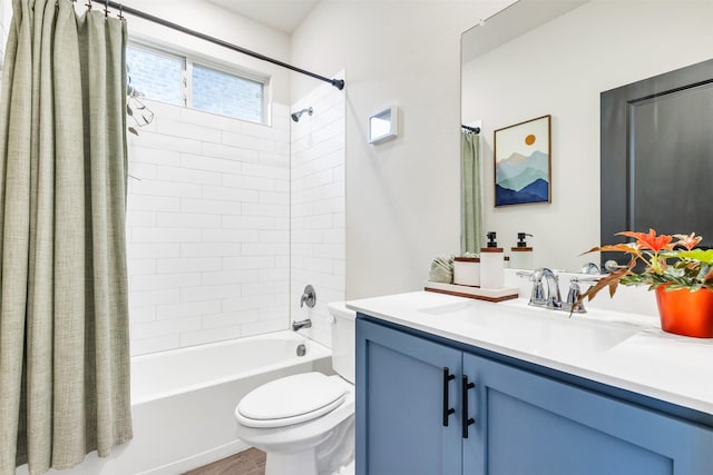 full bathroom with vanity, toilet, and shower / bath combo with shower curtain