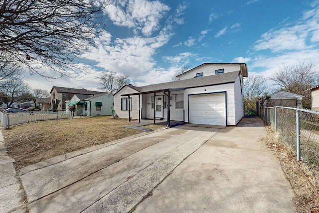 view of front of home with a garage and a front yard