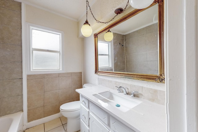 full bathroom with tile patterned flooring, tile walls, vanity, toilet, and tiled shower / bath