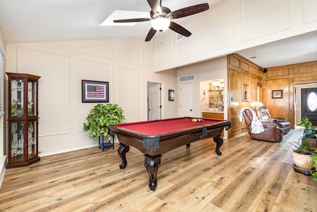 game room featuring ceiling fan, pool table, vaulted ceiling, and light wood-type flooring