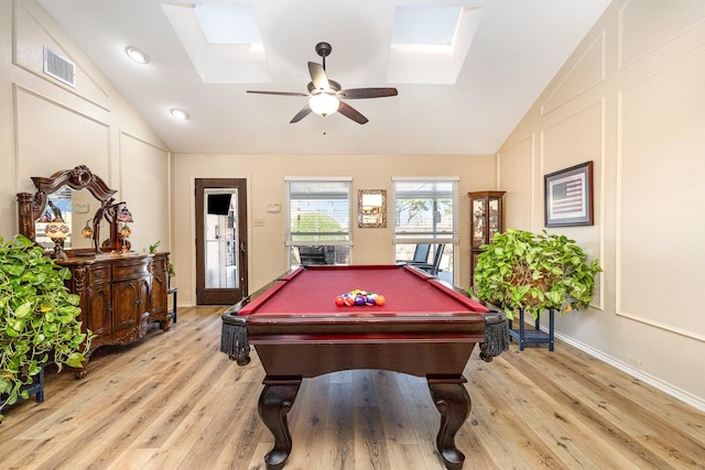 recreation room featuring ceiling fan, pool table, a skylight, and light hardwood / wood-style flooring