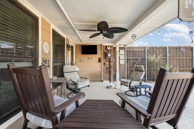 view of patio with ceiling fan