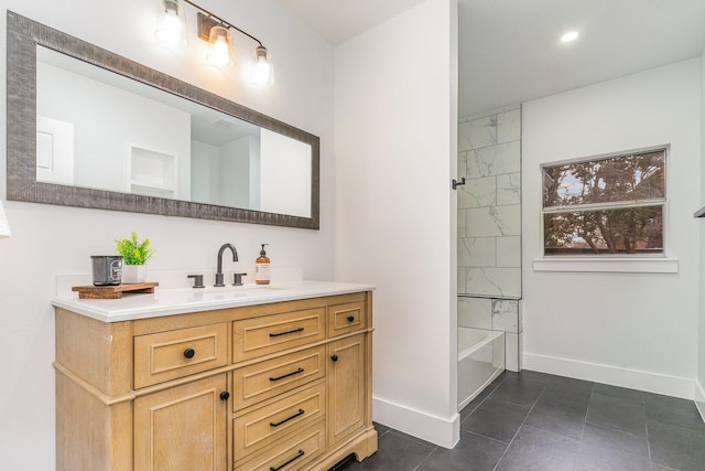 bathroom featuring vanity, tile patterned flooring, and tub / shower combination