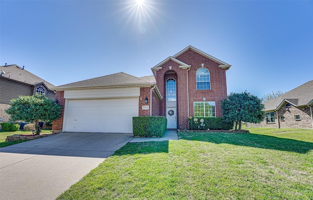 view of front property featuring a garage and a front lawn