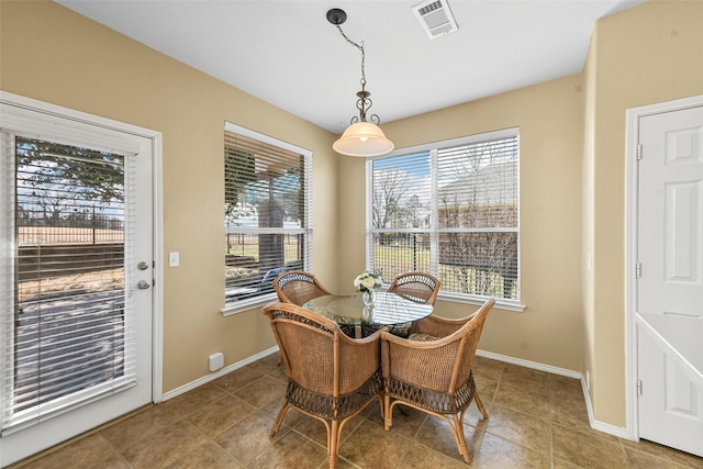 dining space featuring a healthy amount of sunlight