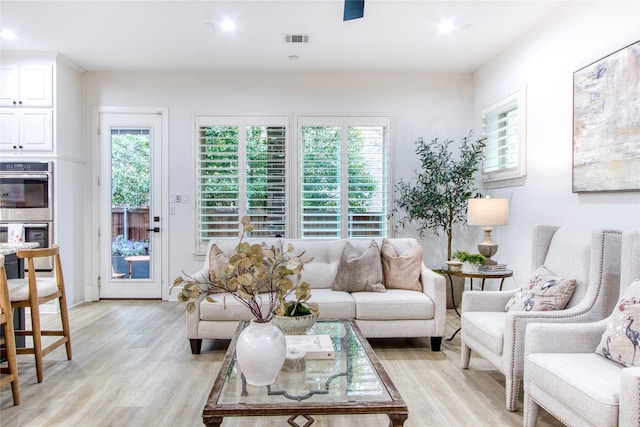 living room with light wood-type flooring