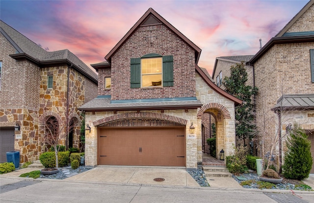 view of front of property featuring a garage