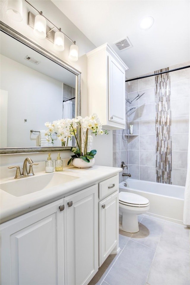 full bathroom featuring tile patterned flooring, vanity, shower / tub combo with curtain, and toilet