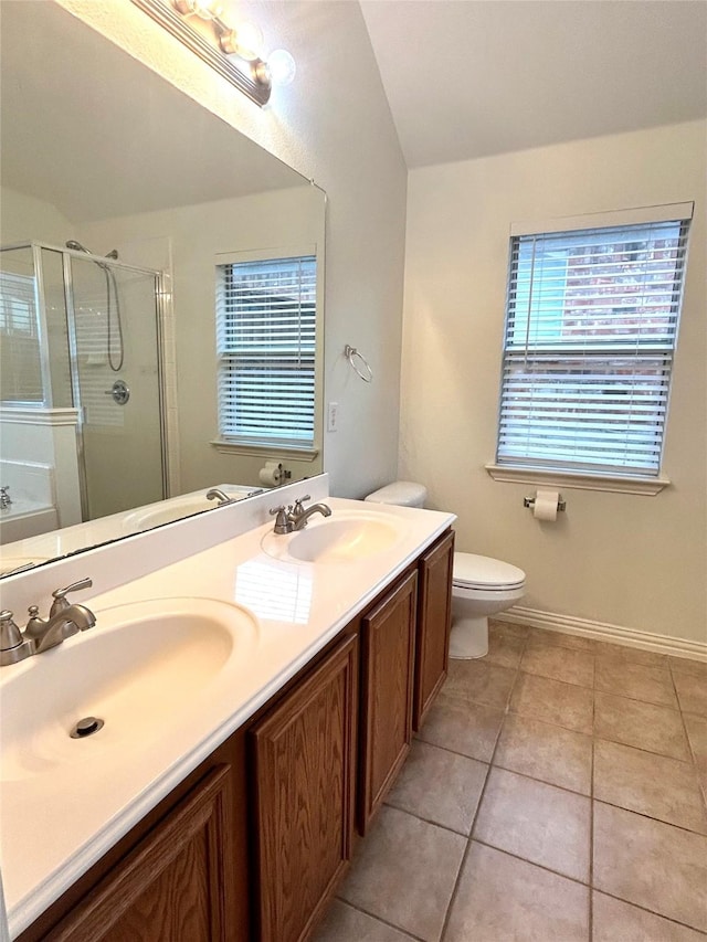 full bathroom with lofted ceiling, toilet, vanity, independent shower and bath, and tile patterned flooring