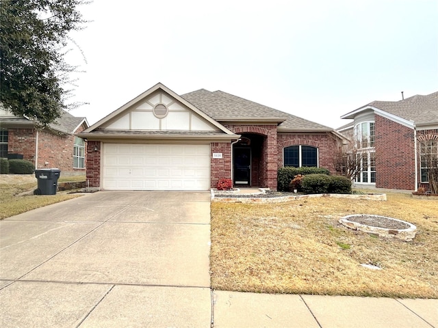 ranch-style home featuring a garage