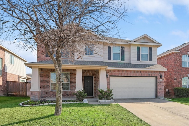 view of front of house featuring a garage and a front yard