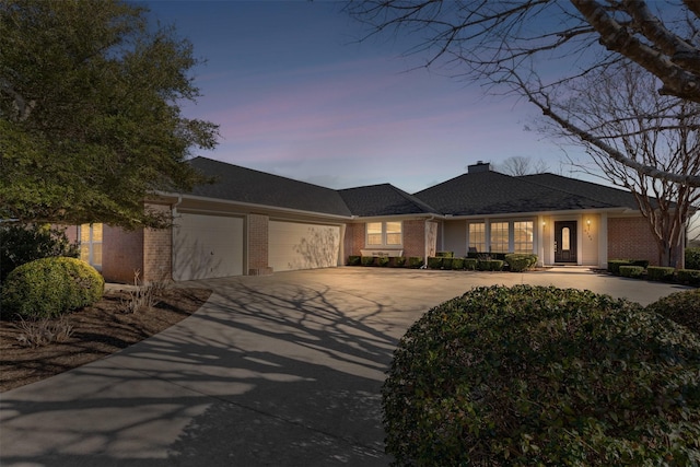 view of front of property featuring a garage