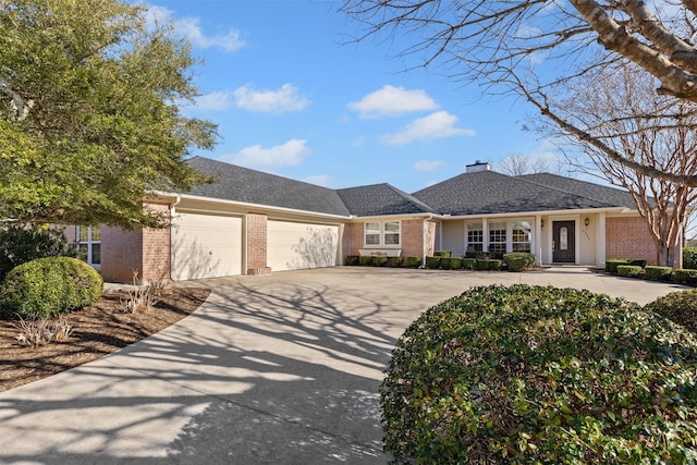 single story home featuring a garage