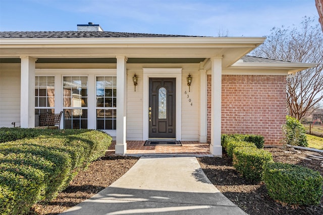 entrance to property with covered porch