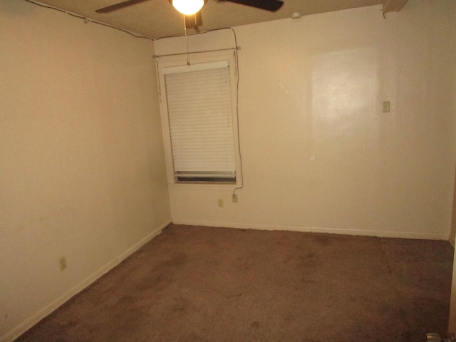 spare room with ceiling fan and carpet floors