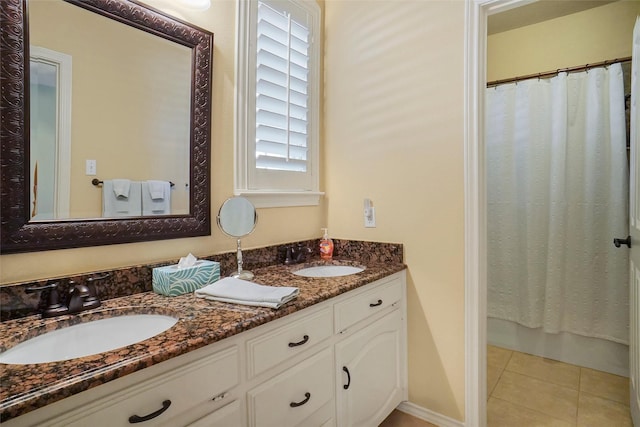 bathroom with tile patterned flooring, vanity, and a shower with shower curtain