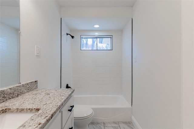 full bath with washtub / shower combination, vanity, toilet, and baseboards